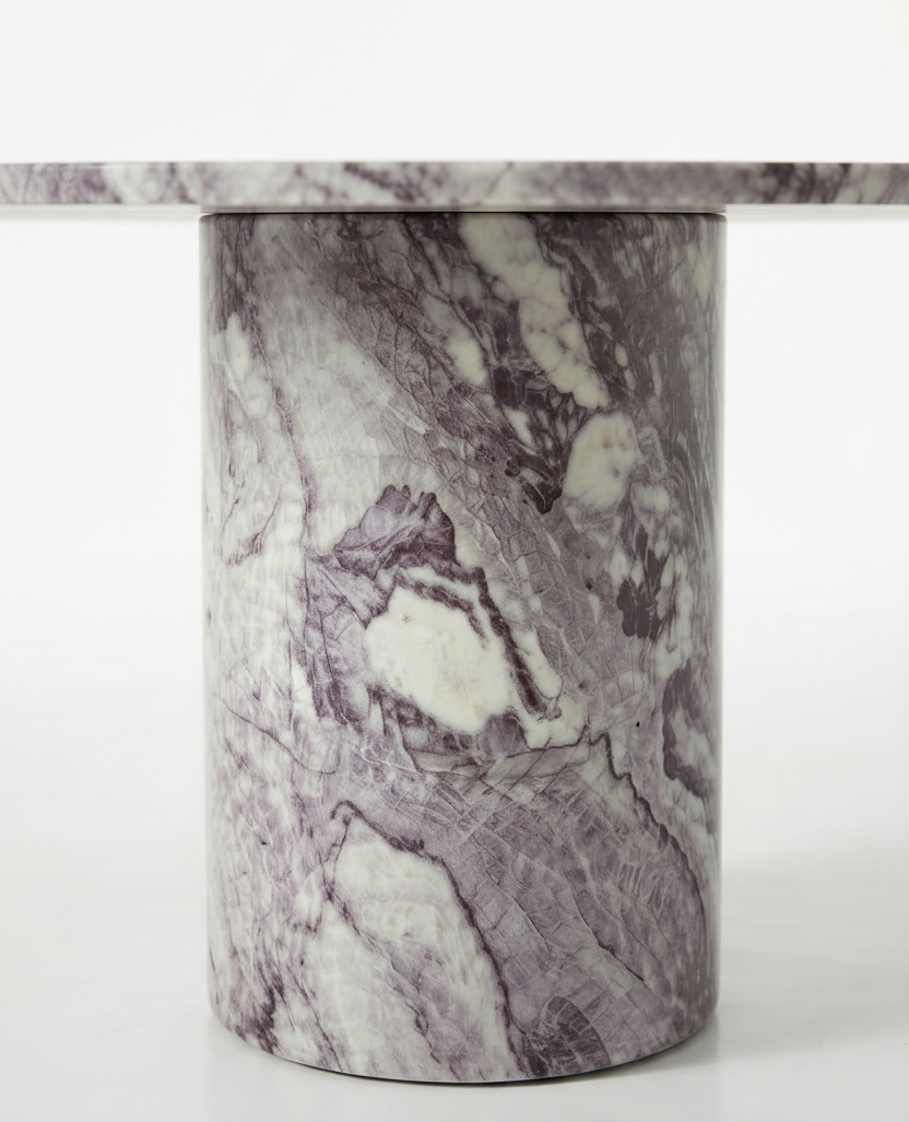 Detail of the Calacatta Viola marble pedestal base showing plum and violet veining